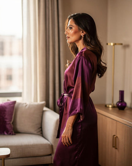 Woman resting calmly by a window in a minimalist styled room