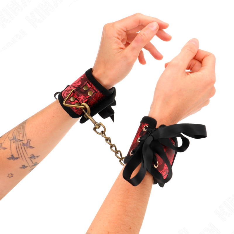 KINK - SKANDAL HANDFESSELN ROT-SCHWARZE SPITZENDETAILS 24,5 CM X 6,5 CM