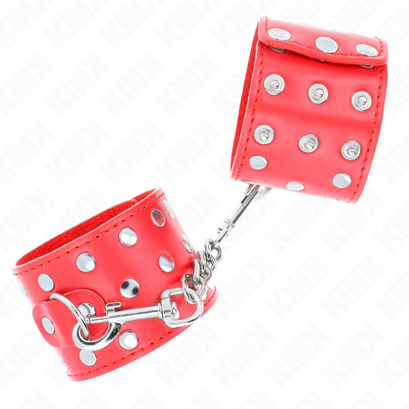 KINK – HANDFESSELN MIT DRUCKVERSCHLUSS VOLL MIT NIETEN ROT VERSTELLBAR 19-24 CM X 5,5 CM