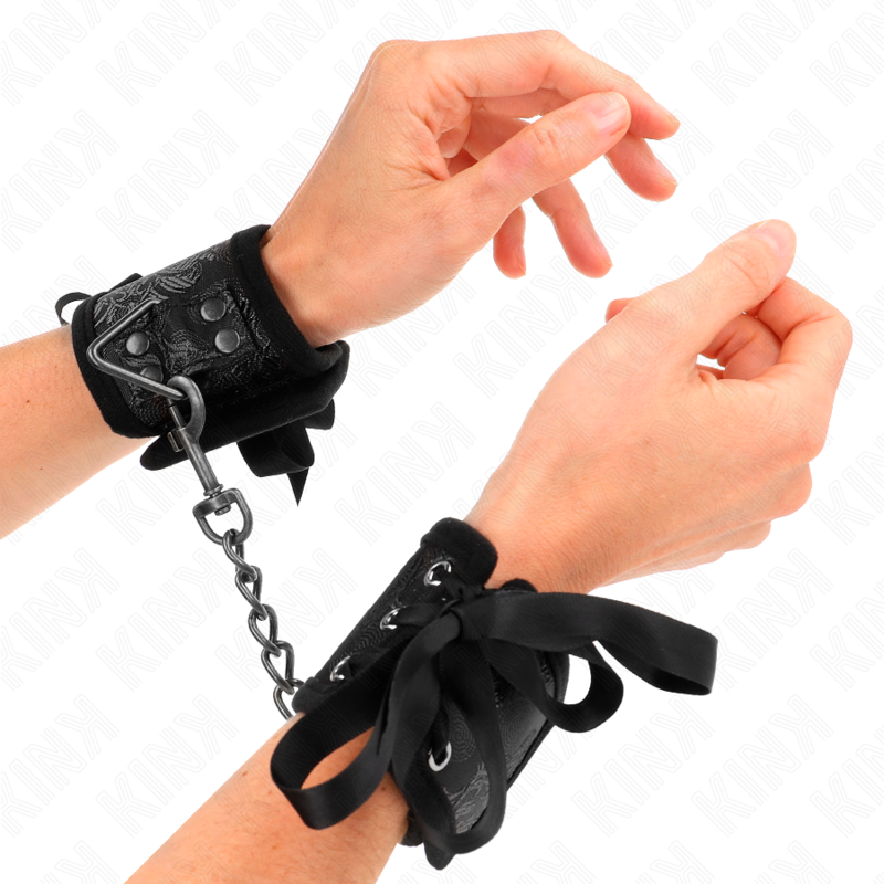 KINK - SCANDAL HANDFESSELN SCHWARZ SPITZENDETAILS 24,5 CM X 6,5 CM