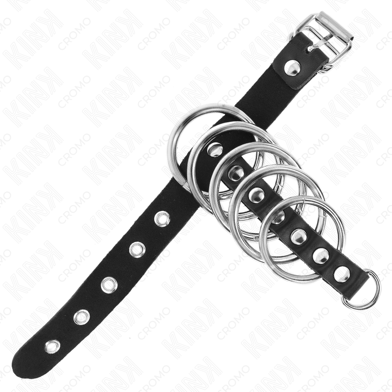 KINK – PENISRING AUS LEDER MIT VERSCHLUSSRIEMEN 21 X 2 CM UND 5 METALLRINGEN VON 3 CM BIS 4 CM